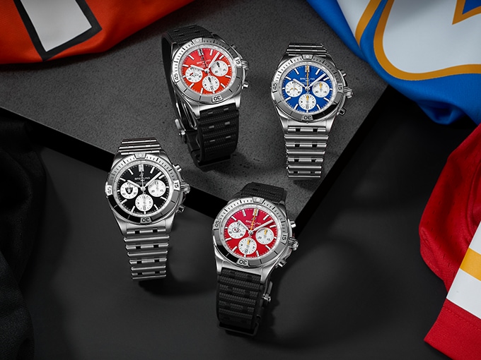 The four watches of the AFC South teams, with dials in the colours orange, blue, black and red.