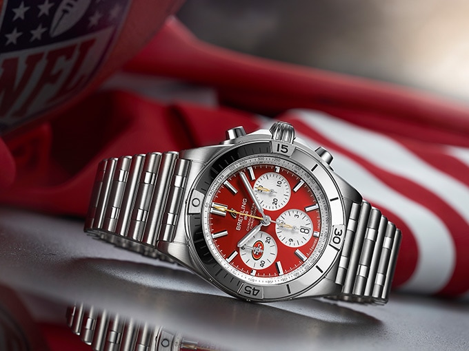 The Chronomat B01 42 NFL San Francisco 49ers Edition with a red dial and rubber straps.